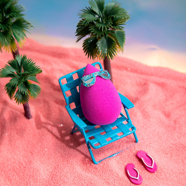 Beautyblender laying in the sun image for sunscreen application
